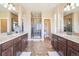 Spacious bathroom with double vanity sinks and a glass-enclosed shower at 311 Portmeirion Ln, Castle Rock, CO 80104