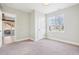 This bedroom is the perfect place to relax, offering a large window to let light in at 311 Portmeirion Ln, Castle Rock, CO 80104