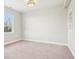 Bright bedroom boasts a neutral color scheme, large window, and a modern ceiling fan at 311 Portmeirion Ln, Castle Rock, CO 80104