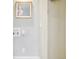 A useful laundry room comes with newer appliances and a whimsical picture to make chores more enjoyable at 311 Portmeirion Ln, Castle Rock, CO 80104