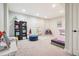 Spacious playroom with soft carpet, ample lighting, and plenty of room for activities at 311 Portmeirion Ln, Castle Rock, CO 80104