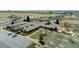 Scenic aerial view of community showcases landscaping, road access, and convenient parking at 5425 County Road 32 # 14, Mead, CO 80504