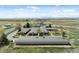 Expansive aerial view of community features lush fields and easy road access at 5425 County Road 32 # 14, Mead, CO 80504