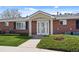 Charming brick home with a welcoming entrance and well-manicured lawn at 5425 County Road 32 # 14, Mead, CO 80504