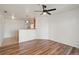 Open-concept living room features modern flooring, fan, and well-lit space at 5425 County Road 32 # 14, Mead, CO 80504