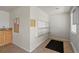 Mail room featuring tile flooring, multiple mailboxes, a bulletin board, and natural light at 5425 County Road 32 # 14, Mead, CO 80504