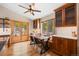 Cozy dining area with a window view and stylish furnishings at 9239 Black Mountain Dr, Conifer, CO 80433