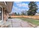 Backyard with stone patio and grass at 380 S Xanadu St, Aurora, CO 80012