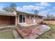 Exterior view of backyard featuring stone patio and grass at 380 S Xanadu St, Aurora, CO 80012