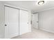Bedroom with closet and access door to the hallway at 380 S Xanadu St, Aurora, CO 80012
