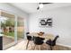 Charming dining area with sliding glass doors leading to the backyard, perfect for indoor-outdoor living at 380 S Xanadu St, Aurora, CO 80012
