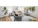 Bright living room with stylish furniture, a large window, and contemporary decor at 380 S Xanadu St, Aurora, CO 80012