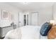 View of the spacious main bedroom showing closet, ensuite entrance, decor, and natural light at 380 S Xanadu St, Aurora, CO 80012