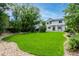 Spacious backyard featuring lush lawn and rock landscaping at 3775 Balderas St, Brighton, CO 80601