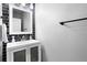 Half bath with vanity and modern fixtures at 3775 Balderas St, Brighton, CO 80601