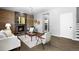 Inviting living room with a wood-burning fireplace and an open layout at 3775 Balderas St, Brighton, CO 80601