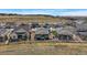 Neighborhood aerial showing a back yard, fencing and landscaping at 5611 Saddle Skirt St, Parker, CO 80134
