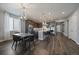 Spacious eat-in kitchen featuring a center island, stainless steel appliances, and dining table at 5611 Saddle Skirt St, Parker, CO 80134