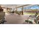 Charming covered back patio with ample seating, perfect for outdoor entertaining and relaxation at 2160 S Flower St, Lakewood, CO 80227