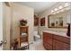 Neutral-toned bathroom featuring granite countertop and stylish fixtures at 2160 S Flower St, Lakewood, CO 80227