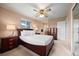 Bedroom featuring a ceiling fan, natural light, and neutral paint at 2160 S Flower St, Lakewood, CO 80227