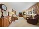 Bright living room with comfortable seating, a large window, and tasteful decor, creating an inviting space at 2160 S Flower St, Lakewood, CO 80227