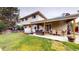 Backyard featuring patio, seating area, hot tub, and lawn at 6278 E Euclid Ave, Centennial, CO 80111
