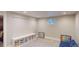 Finished basement area with recessed lighting, storage, and a window for natural light at 6278 E Euclid Ave, Centennial, CO 80111