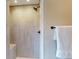 Modern tiled shower with built-in bench and bronze fixtures offers a luxurious experience at 6278 E Euclid Ave, Centennial, CO 80111