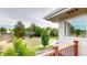 Enjoy the community view from this deck with wood railings and a home with large windows at 6278 E Euclid Ave, Centennial, CO 80111