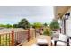 Relax on this spacious deck with wood railings and take in neighborhood views at 6278 E Euclid Ave, Centennial, CO 80111