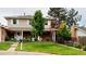 Charming two-story home with a front porch, lovely landscaping, and an upper deck at 6278 E Euclid Ave, Centennial, CO 80111