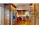 Updated kitchen with stainless steel appliances and wood cabinets at 6278 E Euclid Ave, Centennial, CO 80111