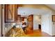 Open concept kitchen, dining area, and access to a bathroom at 6278 E Euclid Ave, Centennial, CO 80111