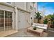 Backyard patio with outdoor seating, lush landscaping, and sliding glass doors at 12332 Colorado Blvd # 30, Thornton, CO 80241
