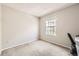 Neutral bedroom with window and desk, offering a clean and versatile space at 12332 Colorado Blvd # 30, Thornton, CO 80241