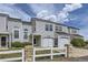 Charming townhome featuring an attached garage and lovely landscaping at 12332 Colorado Blvd # 30, Thornton, CO 80241