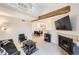 Inviting living room with a fireplace, exposed beam, and open layout at 12332 Colorado Blvd # 30, Thornton, CO 80241