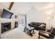 Cozy living room featuring a fireplace, plush carpeting, and sliding glass doors at 12332 Colorado Blvd # 30, Thornton, CO 80241