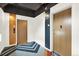 Hallway showing two apartment doors and attractive carpeting leading to both entryways at 603 Inca St # 520, Denver, CO 80204