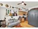 Stylish living room with hardwood floors, a comfortable sofa, stainless appliances and modern kitchen at 603 Inca St # 520, Denver, CO 80204