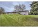 Beautiful home featuring an expansive lawn and mature trees at 10698 W 26Th Ave, Lakewood, CO 80215