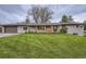 Charming single-story home with a well-manicured lawn and inviting curb appeal at 10698 W 26Th Ave, Lakewood, CO 80215