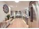 Spacious kitchen with gray cabinets, quartz countertops, and stainless steel appliances at 10698 W 26Th Ave, Lakewood, CO 80215