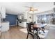 Bright kitchen features white cabinets, stainless steel appliances, and granite countertops at 3980 Home St, Castle Rock, CO 80108