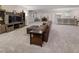 Spacious finished basement featuring a large entertainment area, wet bar, and neutral carpet at 4121 River Oaks St, Castle Rock, CO 80104
