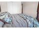Bedroom with sliding closet doors, carpet flooring, and a four poster bed at 4121 River Oaks St, Castle Rock, CO 80104