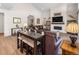 Inviting living room features a fireplace with TV, comfortable seating, and stylish decor at 4121 River Oaks St, Castle Rock, CO 80104