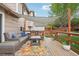 Back deck with a pergola cover, outdoor seating, and privacy fencing at 12753 Buckhorn Creek St, Parker, CO 80134