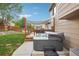 Enjoy the hot tub in this private backyard with a wooden fence, lush green lawn and mature trees at 12753 Buckhorn Creek St, Parker, CO 80134